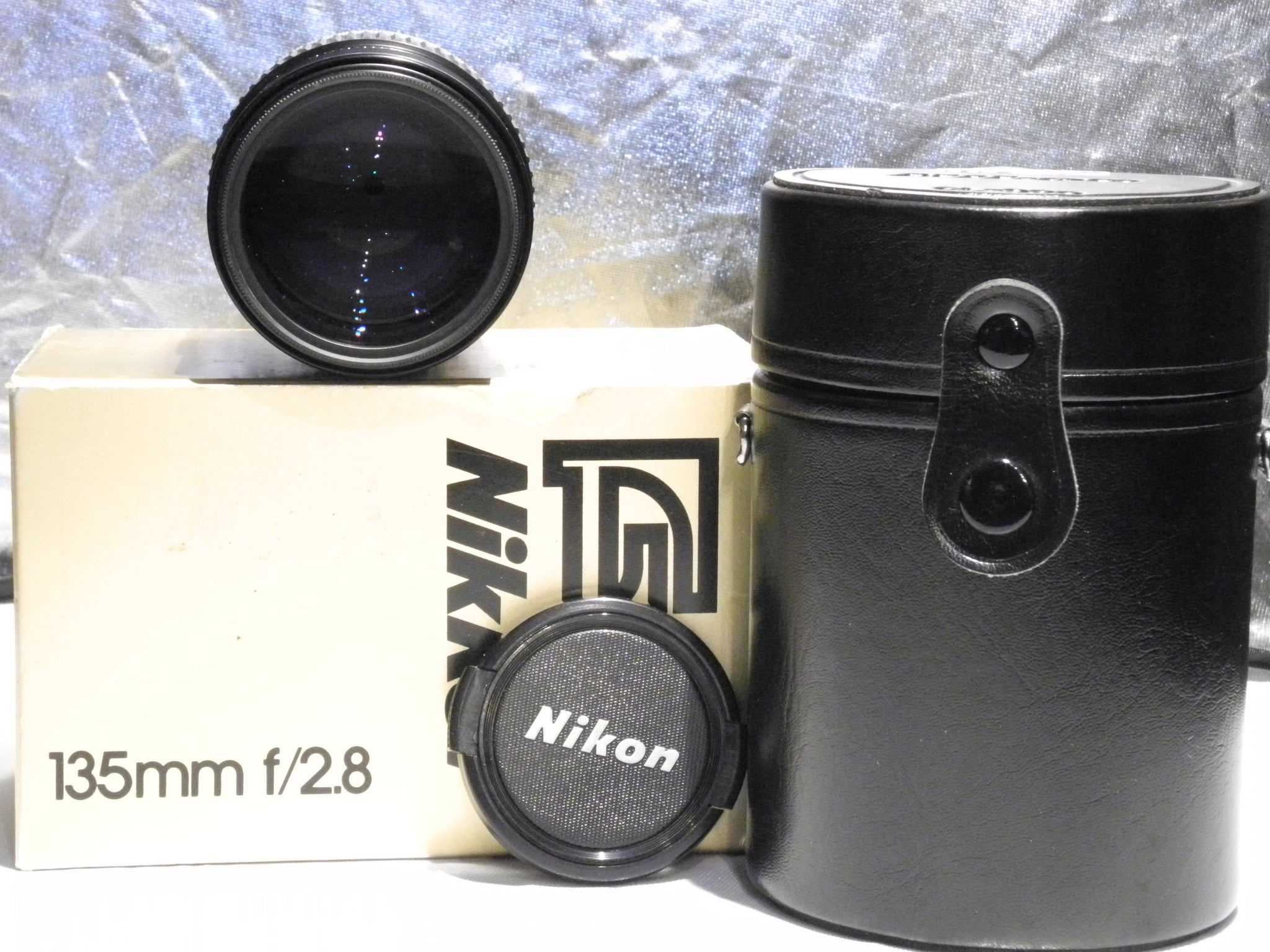 Objectif Nikon Nikkor 135 Mm F/2.8 AI - #871953, Avec Bouchons, Bon état