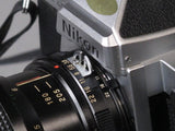 Silver Nikon FE2 35mm Camera with Vivitar 75-205mm f3.8 Macro Focusing Zoom Lens