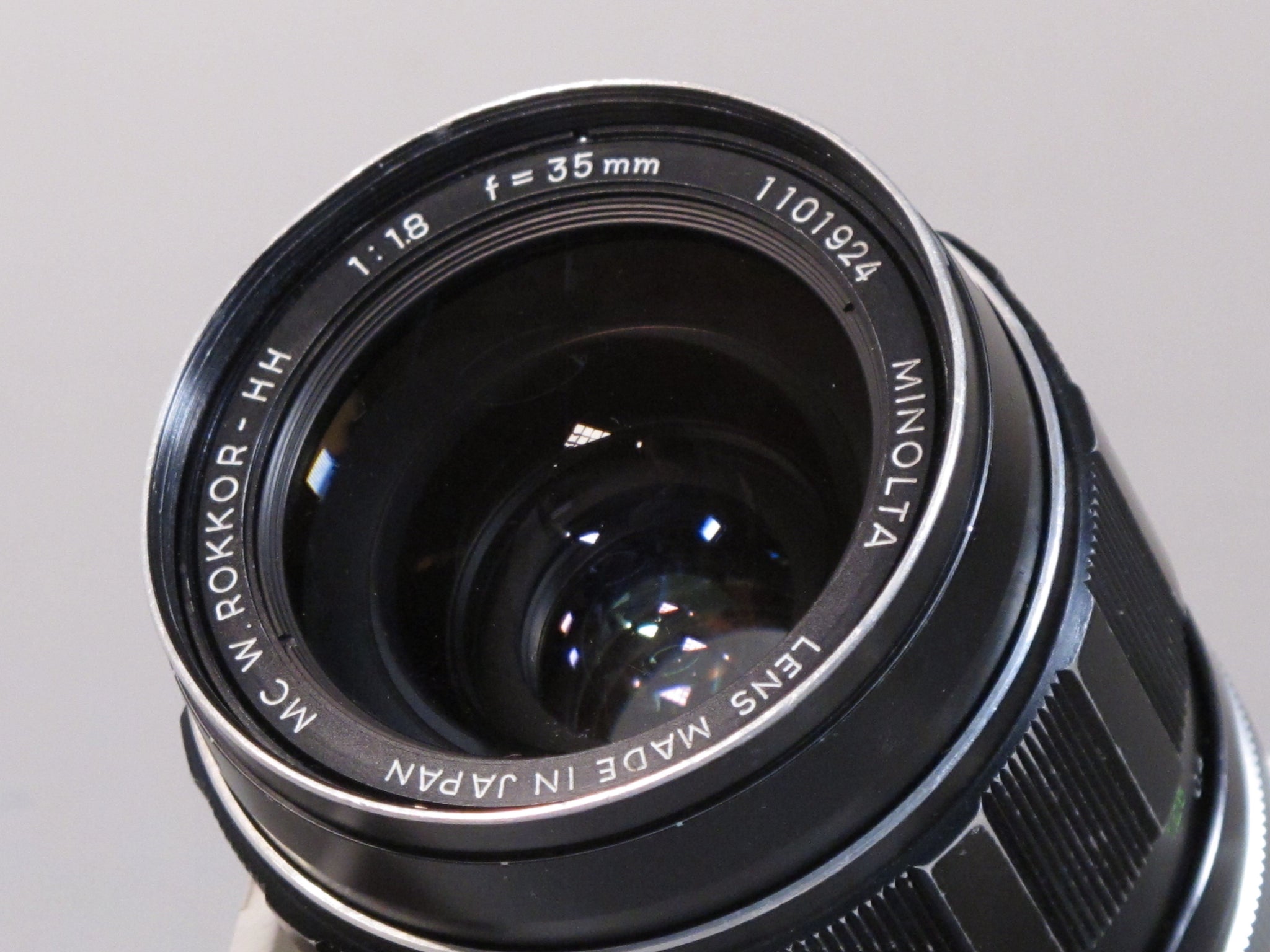 Minolta MC 35mm f1.8 Lens – Phototek Canada
