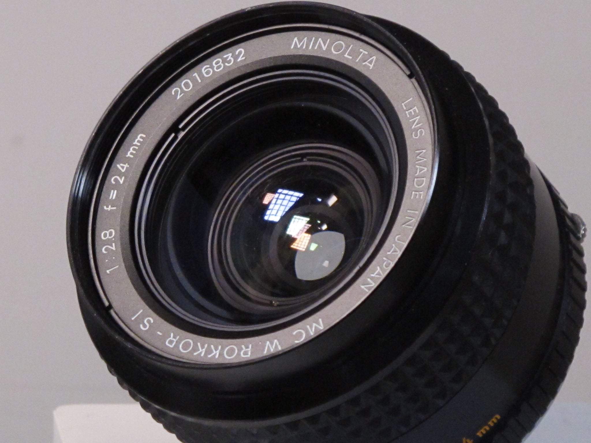 Minolta MC 24mm f2.8 Lens – Phototek Canada
