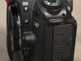 Nikon D90 DSLR Camera Body with Nikon MB-D80 Multipower Battery Pack